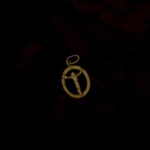 14kt gold. Crucifix pendant. Ideal for necklace or bracelet charm.